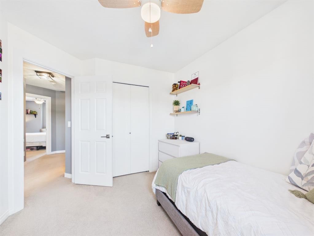 2049 New Brighton Gardens Se, Calgary, AB - Indoor Photo Showing Bedroom