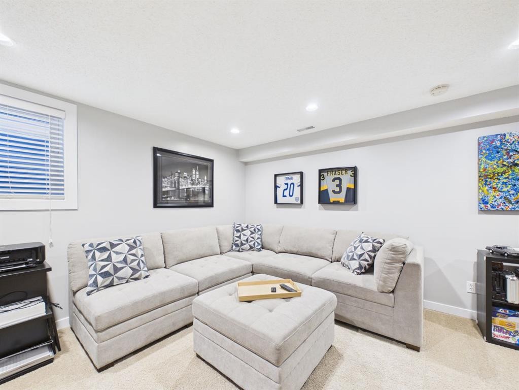 2049 New Brighton Gardens Se, Calgary, AB - Indoor Photo Showing Living Room