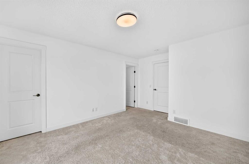 125 Herron Mews Ne, Calgary, AB - Indoor Photo Showing Other Room