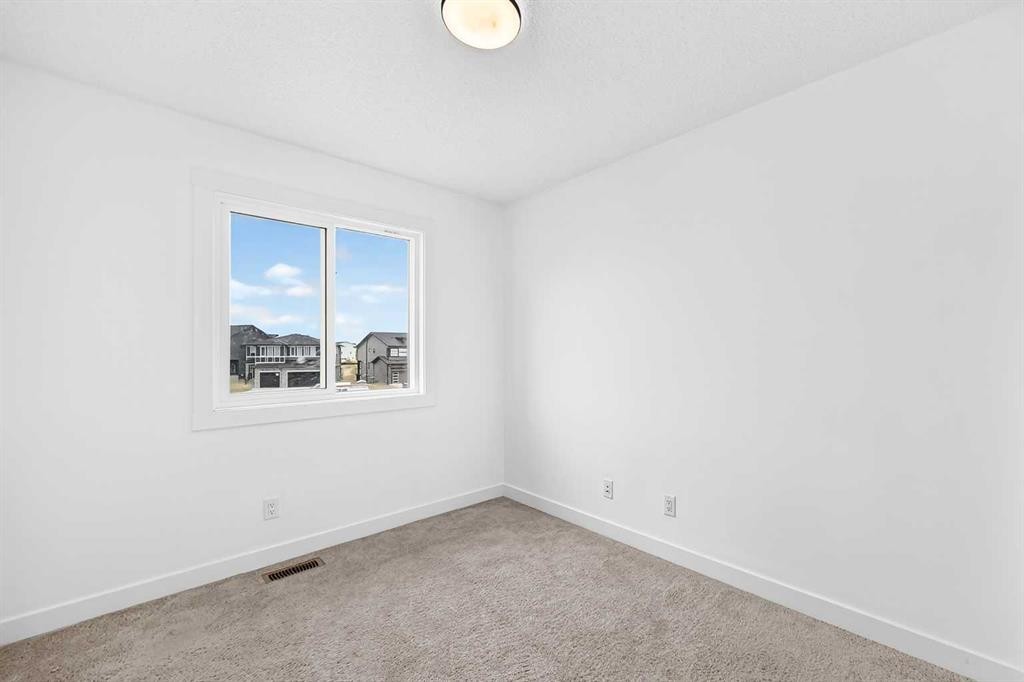 125 Herron Mews Ne, Calgary, AB - Indoor Photo Showing Other Room