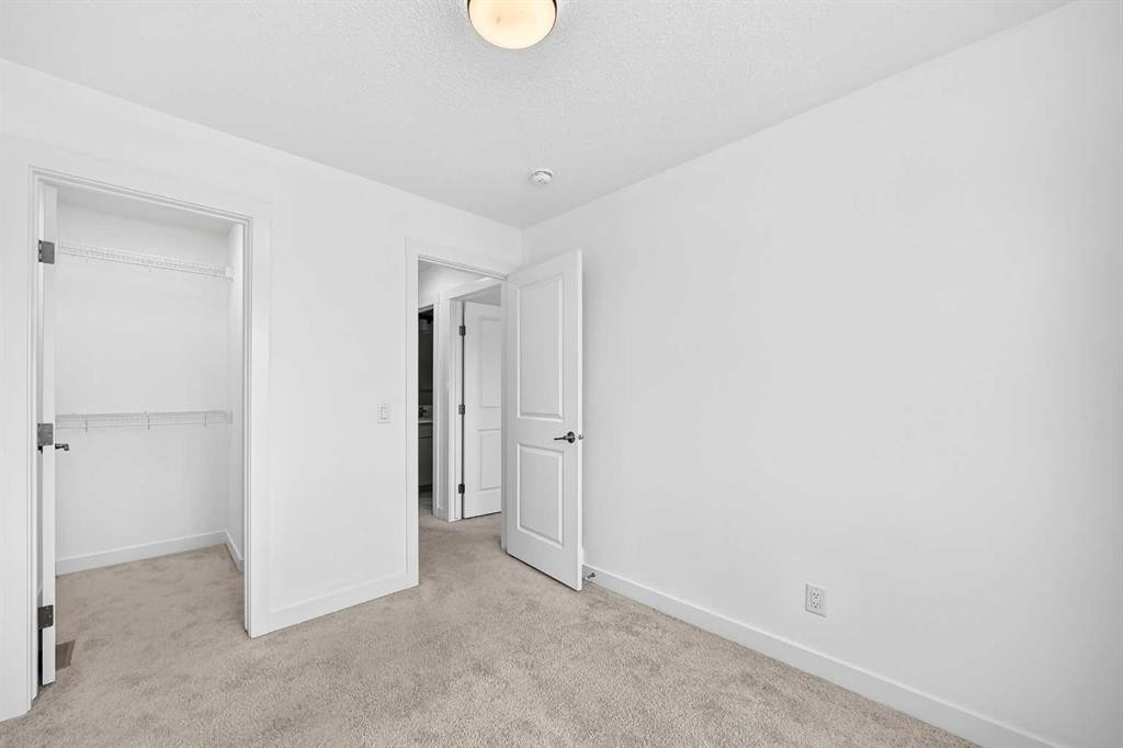 125 Herron Mews Ne, Calgary, AB - Indoor Photo Showing Other Room
