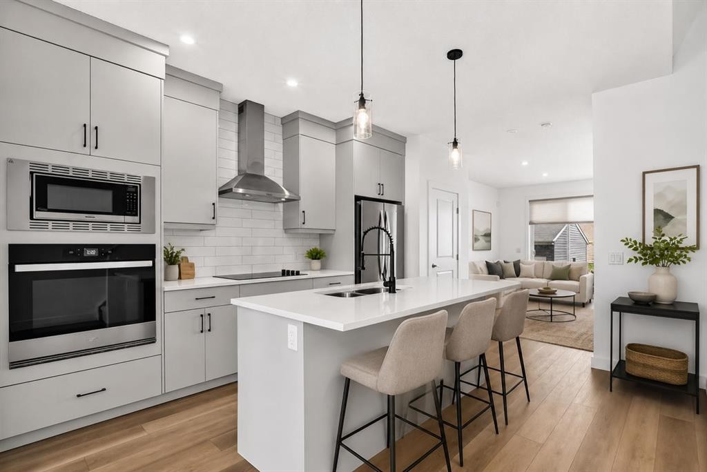 125 Herron Mews Ne, Calgary, AB - Indoor Photo Showing Kitchen With Stainless Steel Kitchen With Double Sink With Upgraded Kitchen
