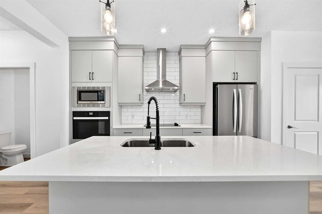 125 Herron Mews Ne, Calgary, AB - Indoor Photo Showing Kitchen With Stainless Steel Kitchen With Upgraded Kitchen