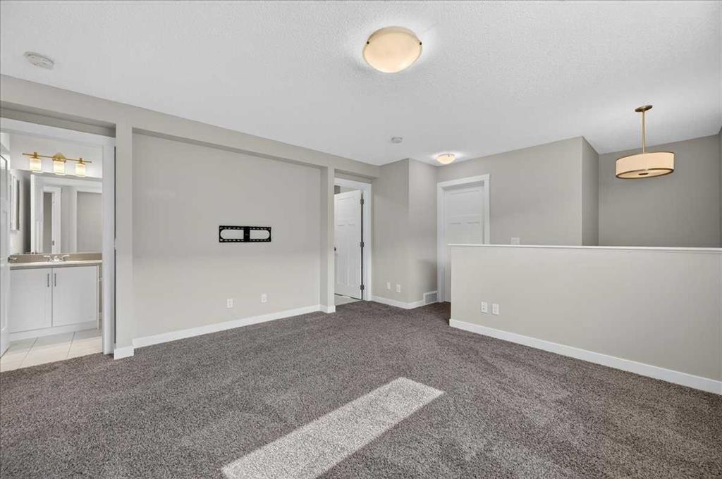 97 Seton Manor Se, Calgary, AB - Indoor Photo Showing Other Room