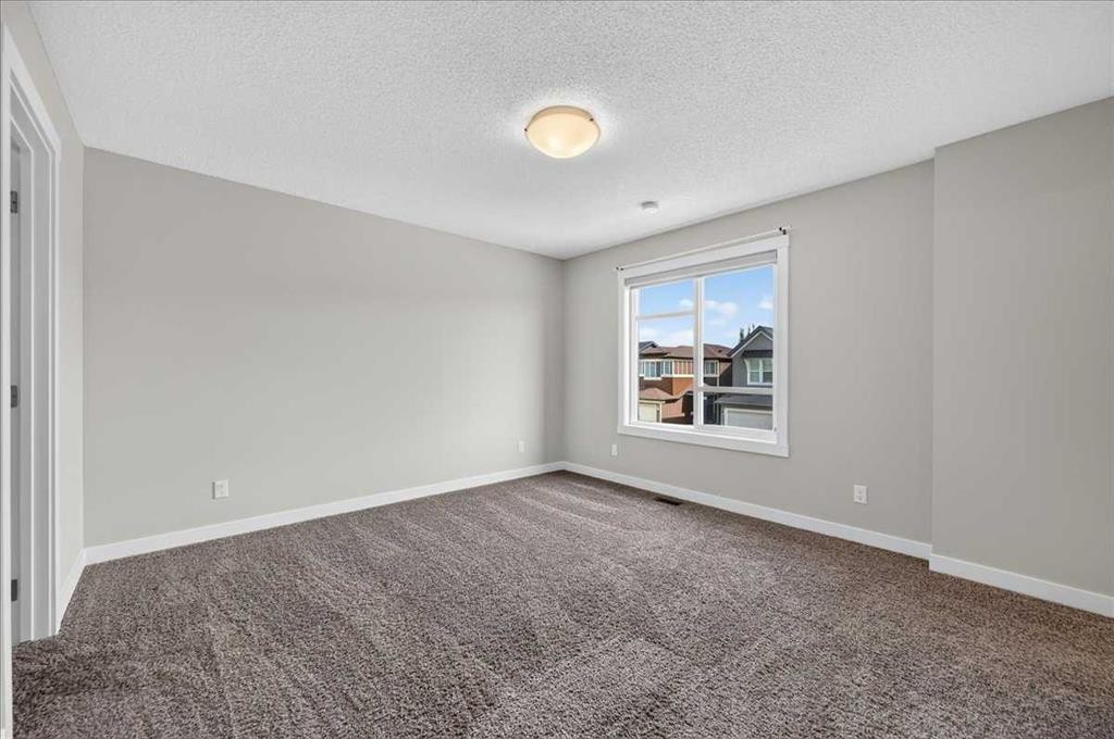 97 Seton Manor Se, Calgary, AB - Indoor Photo Showing Other Room