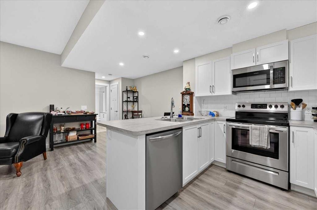97 Seton Manor Se, Calgary, AB - Indoor Photo Showing Kitchen With Double Sink