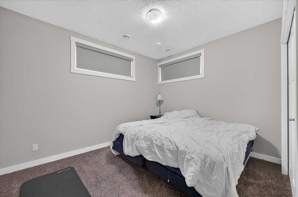 97 Seton Manor Se, Calgary, AB - Indoor Photo Showing Bedroom