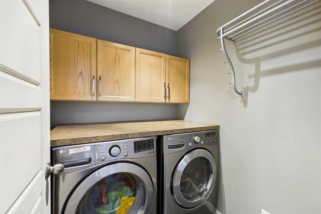 169 Brightonwoods Gardens Se, Calgary, AB - Indoor Photo Showing Laundry Room