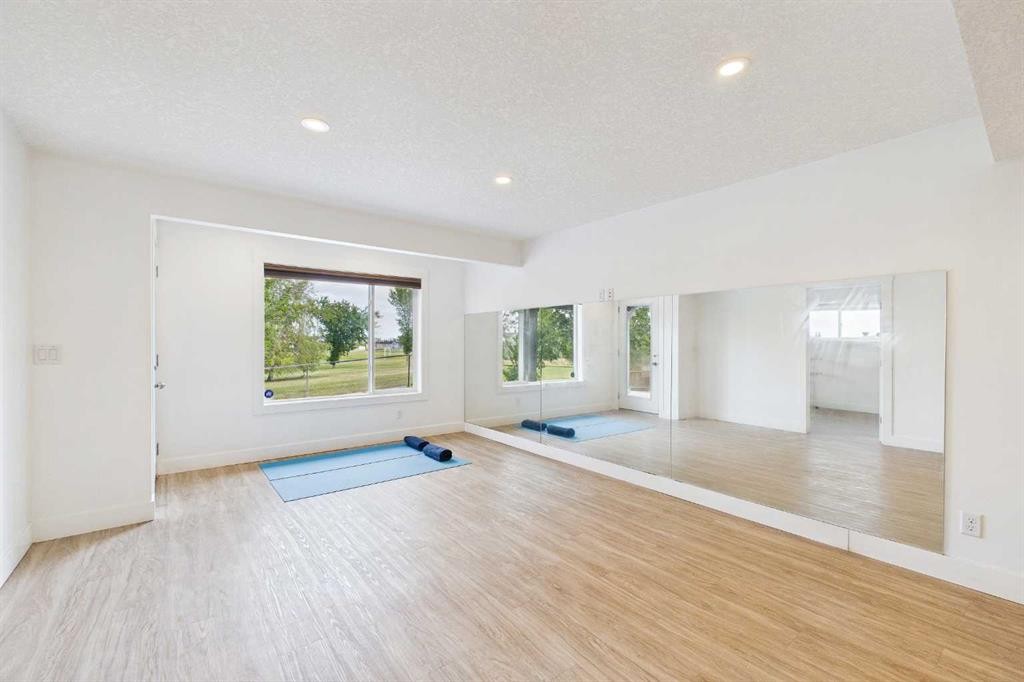 169 Brightonwoods Gardens Se, Calgary, AB - Indoor Photo Showing Other Room