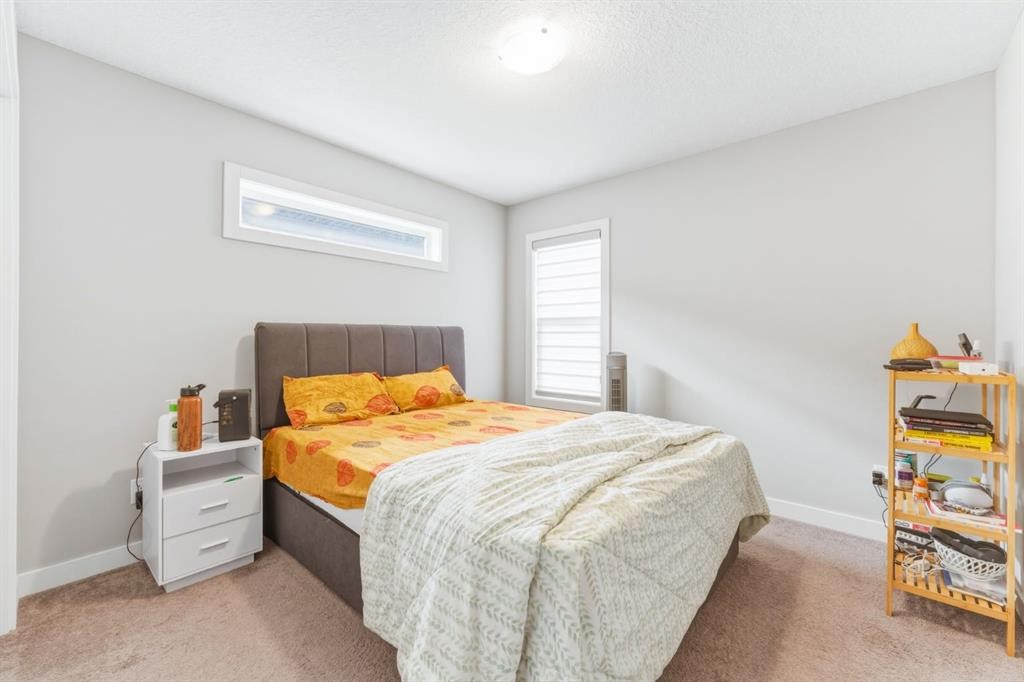 14 Belvedere Point Se, Calgary, AB - Indoor Photo Showing Bedroom