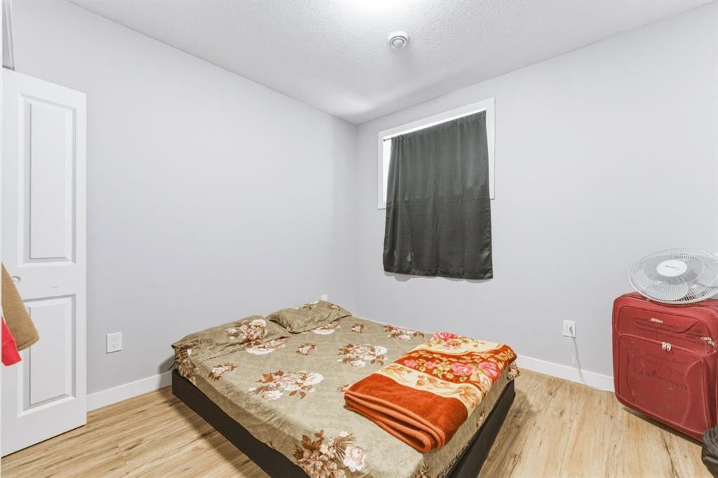14 Belvedere Point Se, Calgary, AB - Indoor Photo Showing Bedroom