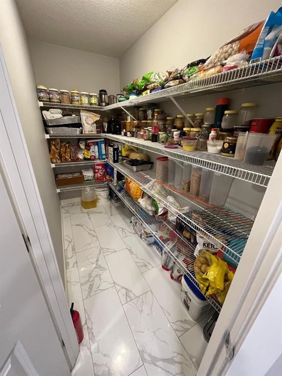14 Belvedere Point Se, Calgary, AB - Indoor With Storage