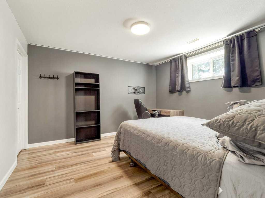 338 Deer Run Place West, Rural Lethbridge County, AB - Indoor Photo Showing Bedroom
