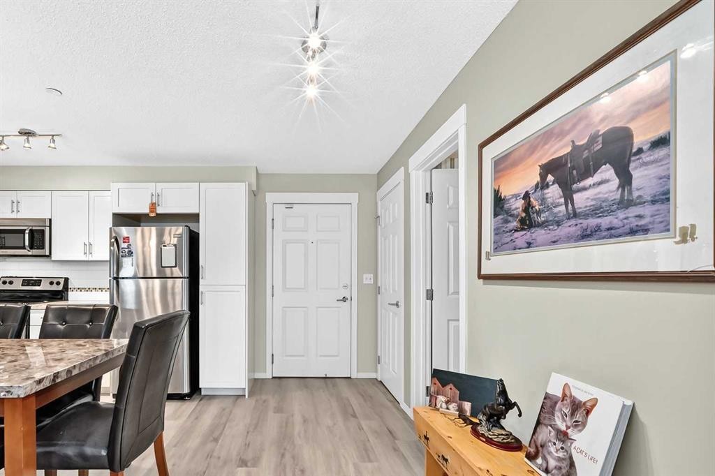 5210-279 Copperpond Common Se, Calgary, AB - Indoor Photo Showing Kitchen With Stainless Steel Kitchen