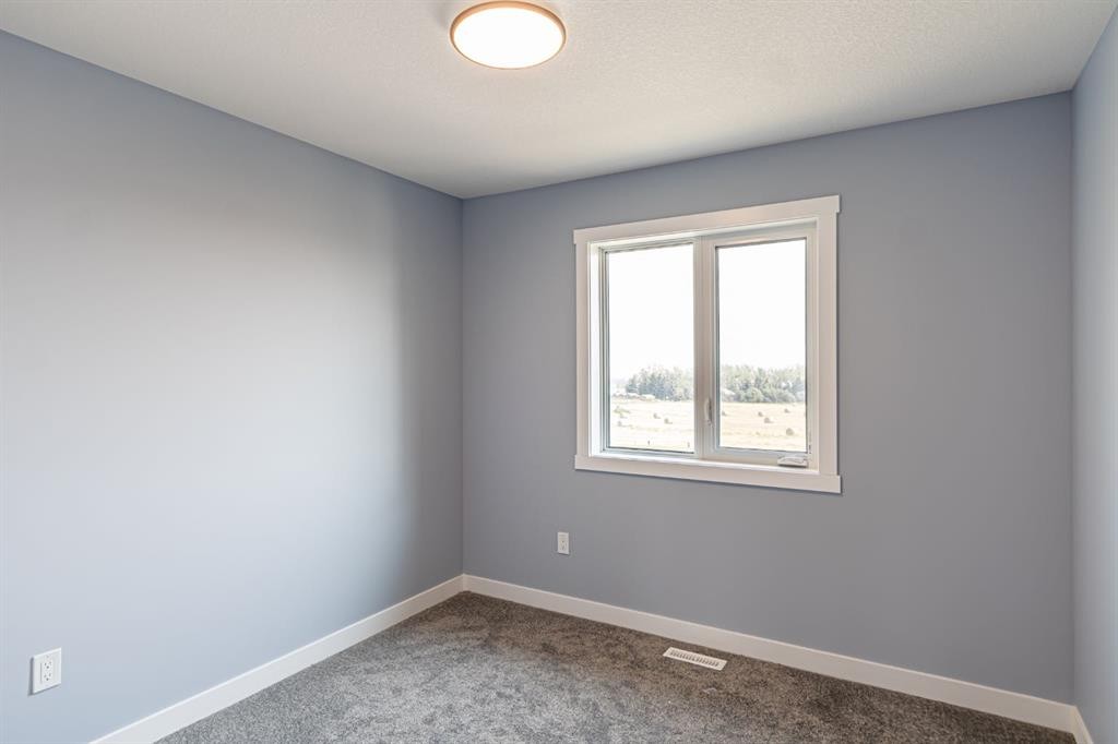 1995 Mccaskill Drive, Crossfield, AB - Indoor Photo Showing Other Room