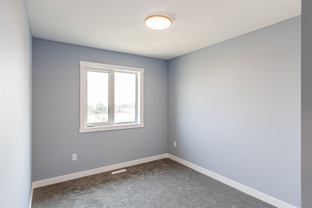 1995 Mccaskill Drive, Crossfield, AB - Indoor Photo Showing Other Room