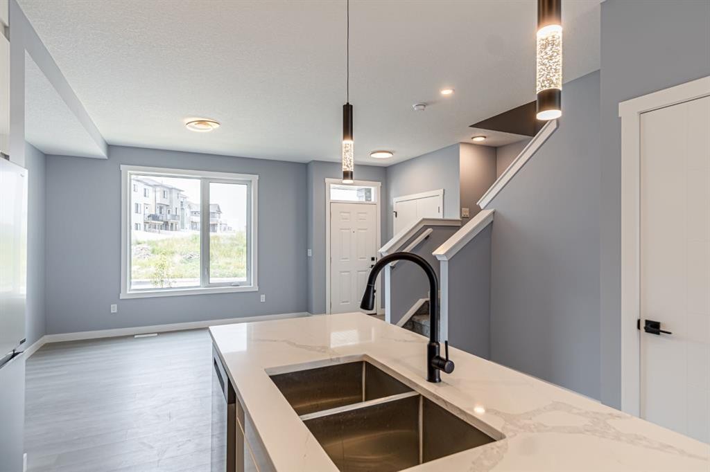 1995 Mccaskill Drive, Crossfield, AB - Indoor Photo Showing Kitchen With Double Sink