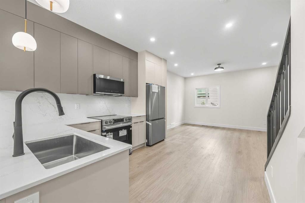 301-67 Panatella Square Nw, Calgary, AB - Indoor Photo Showing Kitchen With Stainless Steel Kitchen With Upgraded Kitchen