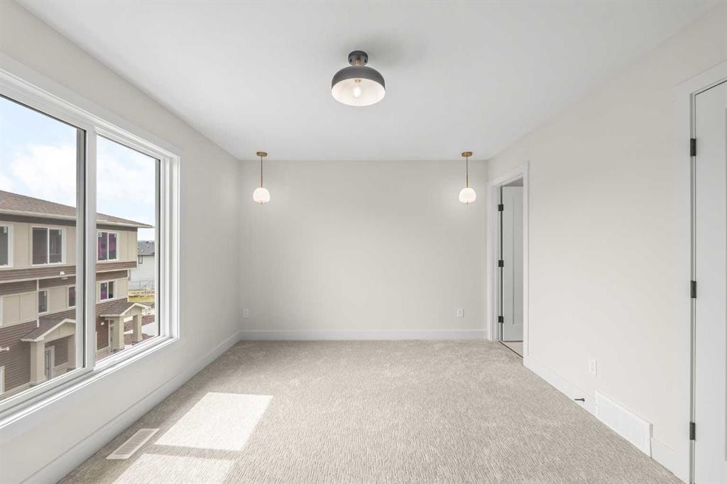 301-67 Panatella Square Nw, Calgary, AB - Indoor Photo Showing Other Room