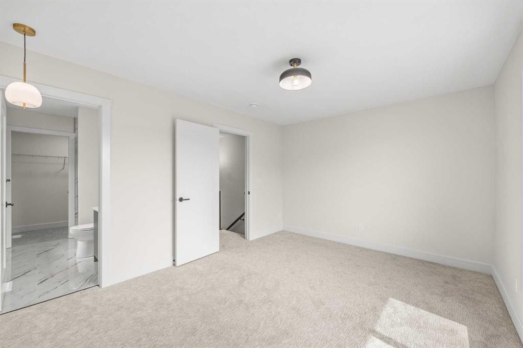 301-67 Panatella Square Nw, Calgary, AB - Indoor Photo Showing Other Room