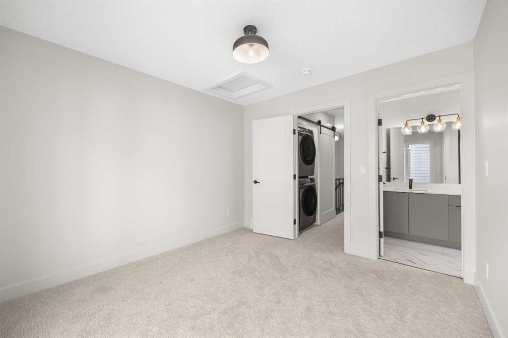 301-67 Panatella Square Nw, Calgary, AB - Indoor Photo Showing Other Room