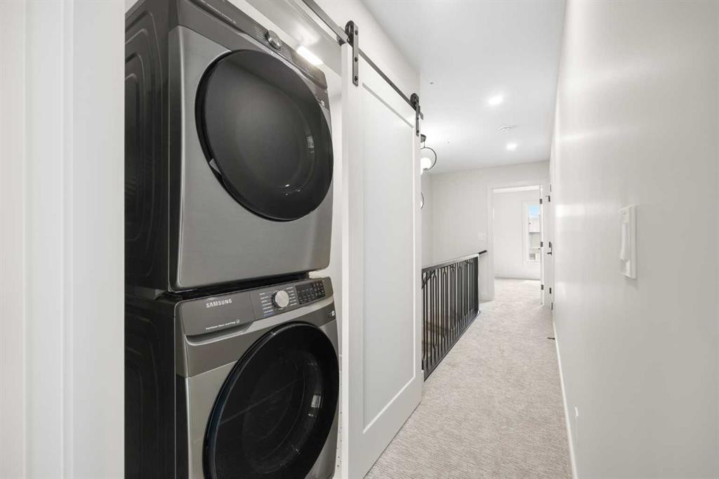 301-67 Panatella Square Nw, Calgary, AB - Indoor Photo Showing Laundry Room