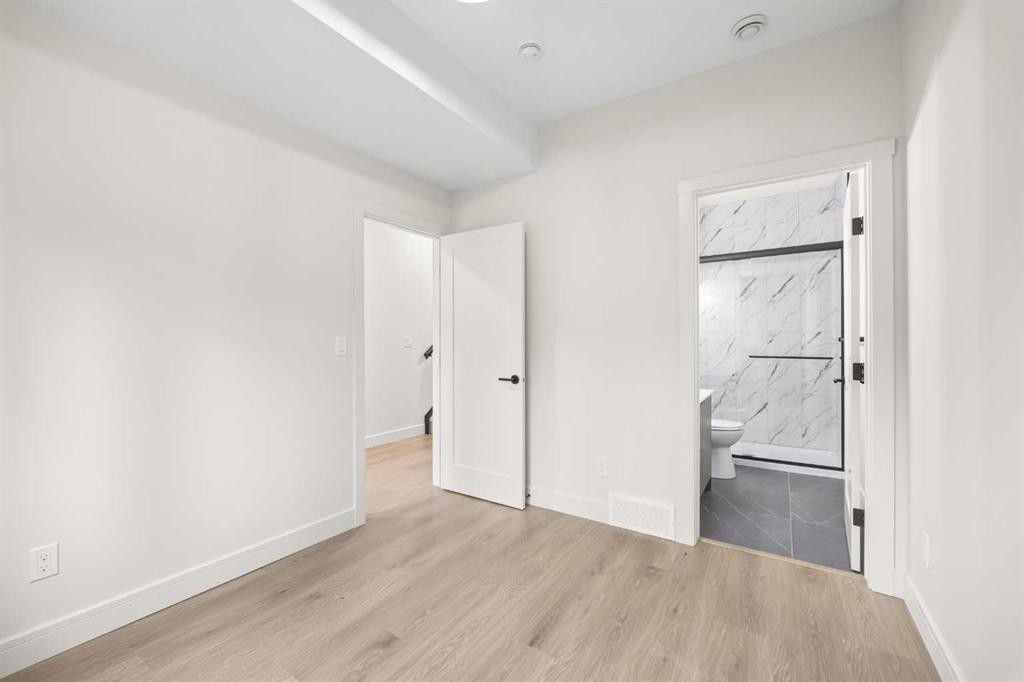 301-67 Panatella Square Nw, Calgary, AB - Indoor Photo Showing Other Room