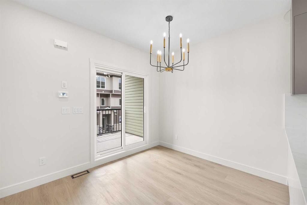 301-67 Panatella Square Nw, Calgary, AB - Indoor Photo Showing Other Room