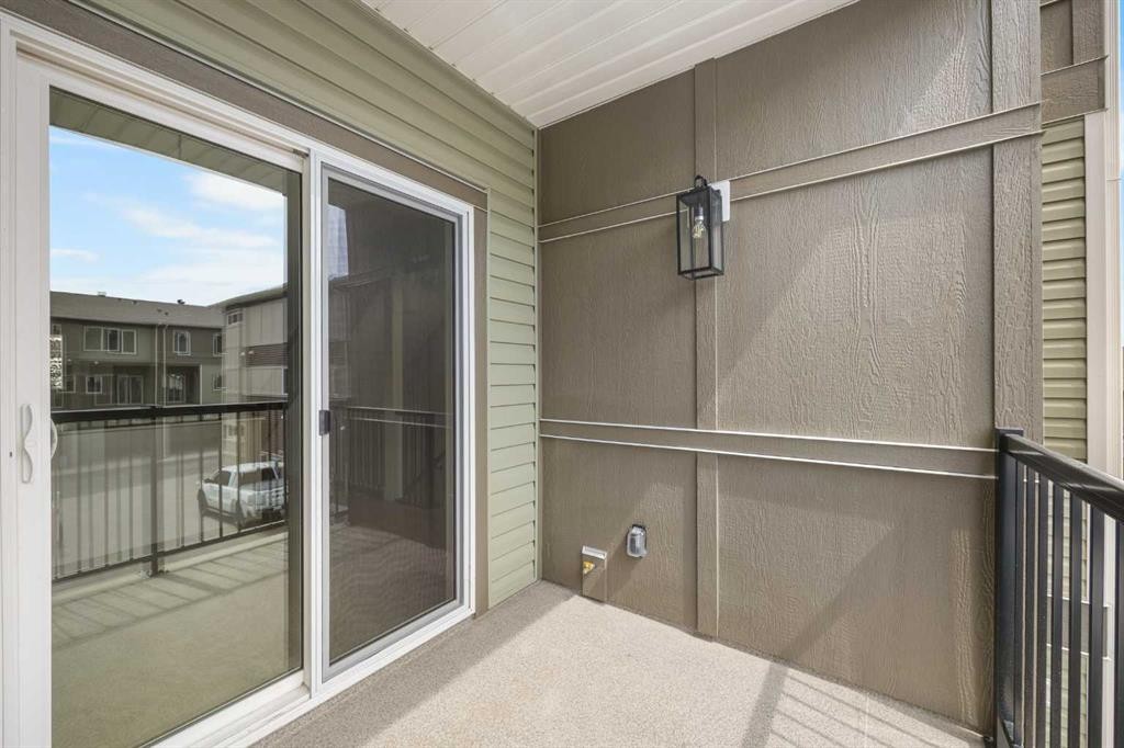 301-67 Panatella Square Nw, Calgary, AB - Outdoor With Balcony With Exterior