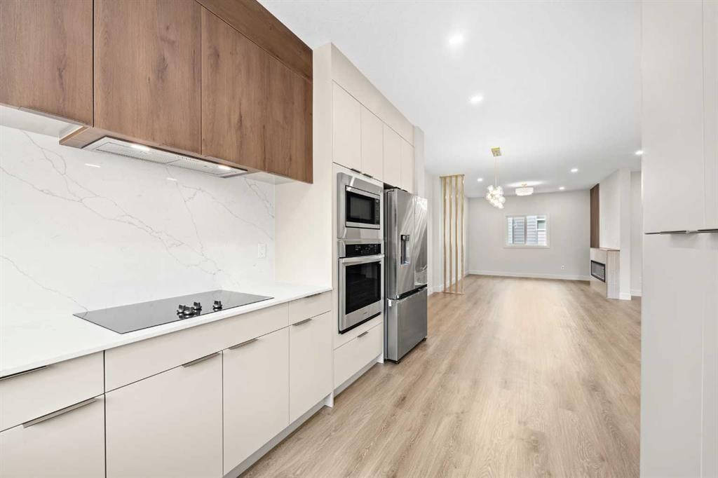302-67 Panatella Square Nw, Calgary, AB - Indoor Photo Showing Kitchen With Upgraded Kitchen