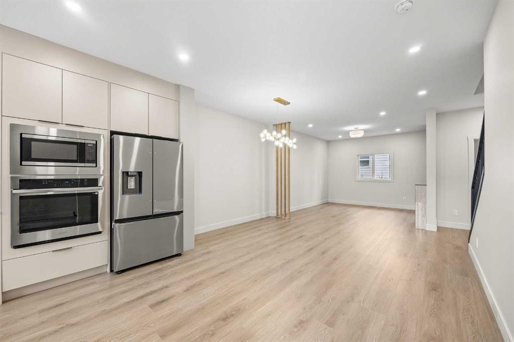 302-67 Panatella Square Nw, Calgary, AB - Indoor Photo Showing Kitchen With Stainless Steel Kitchen