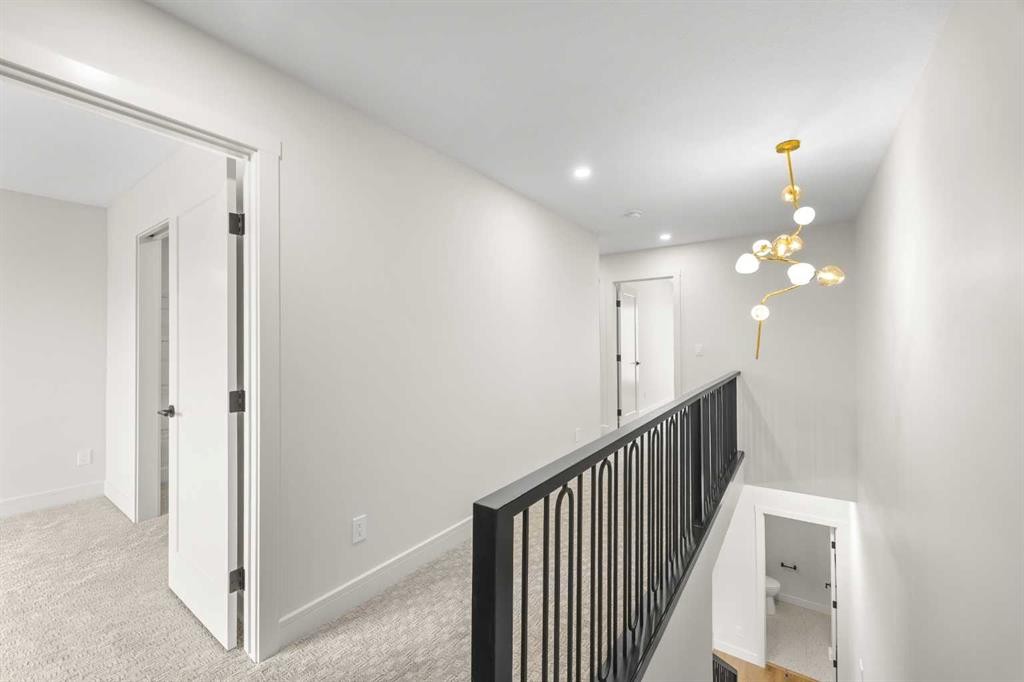 302-67 Panatella Square Nw, Calgary, AB - Indoor Photo Showing Other Room