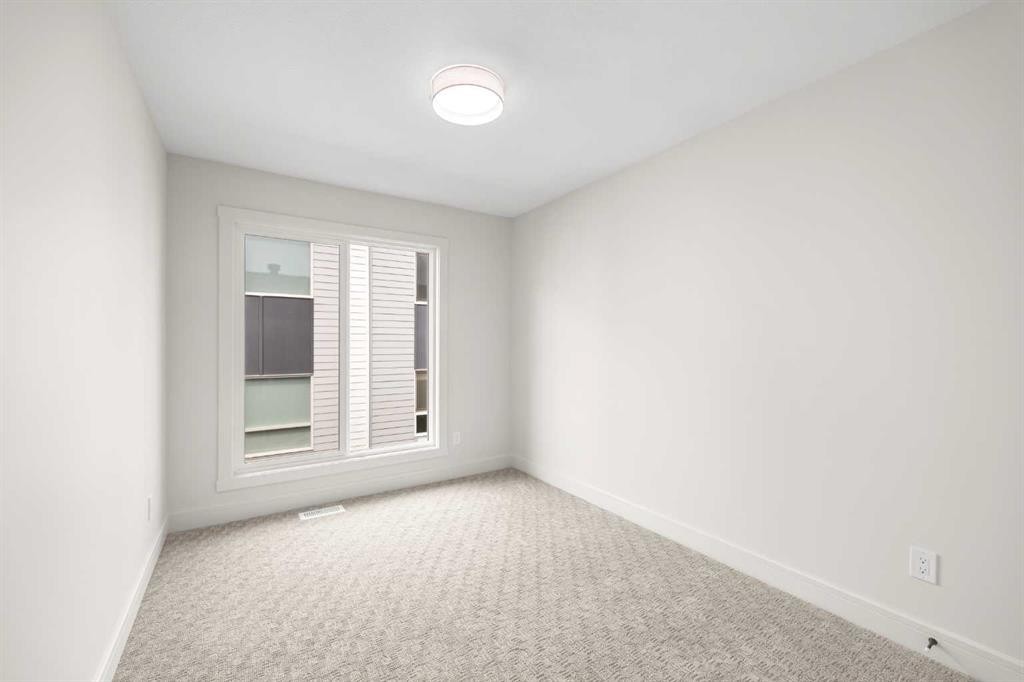 302-67 Panatella Square Nw, Calgary, AB - Indoor Photo Showing Other Room