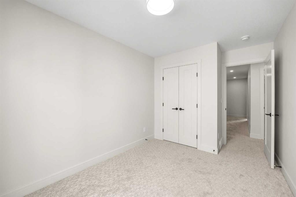 302-67 Panatella Square Nw, Calgary, AB - Indoor Photo Showing Other Room