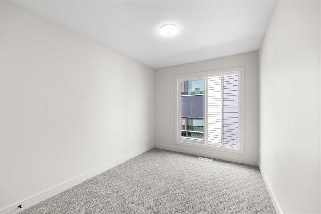 302-67 Panatella Square Nw, Calgary, AB - Indoor Photo Showing Other Room