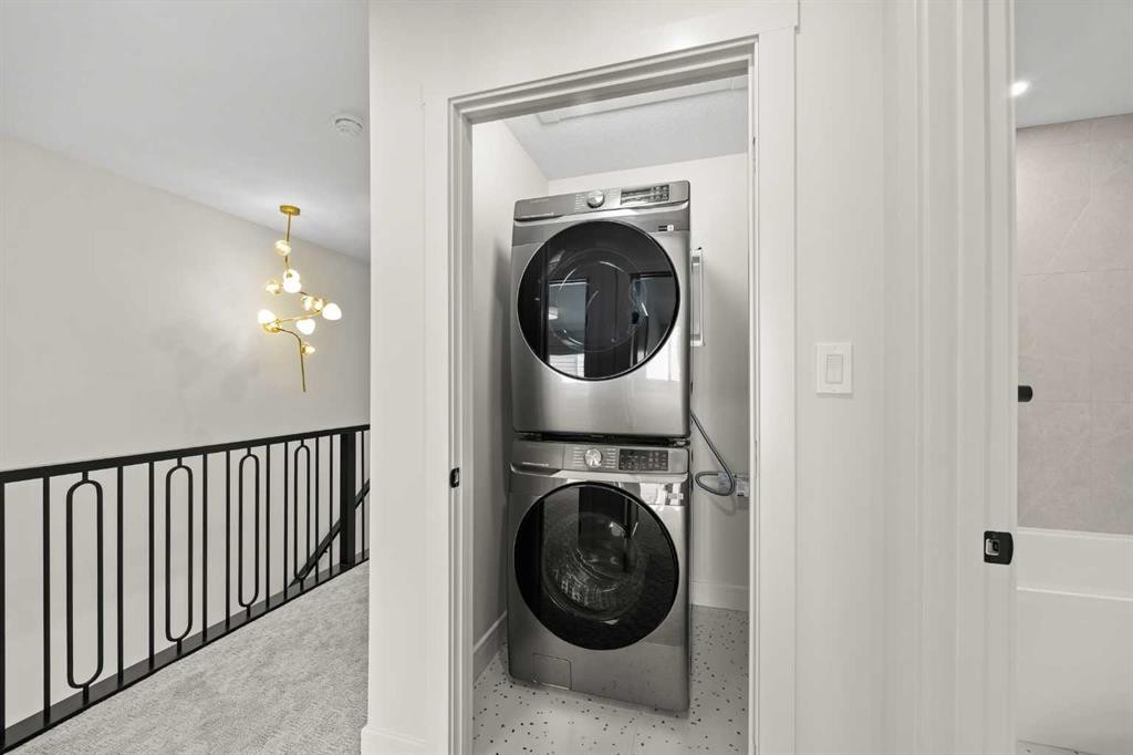 302-67 Panatella Square Nw, Calgary, AB - Indoor Photo Showing Laundry Room