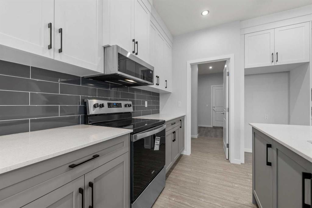 532 Clearwater Heath, Chestermere, AB - Indoor Photo Showing Kitchen With Upgraded Kitchen