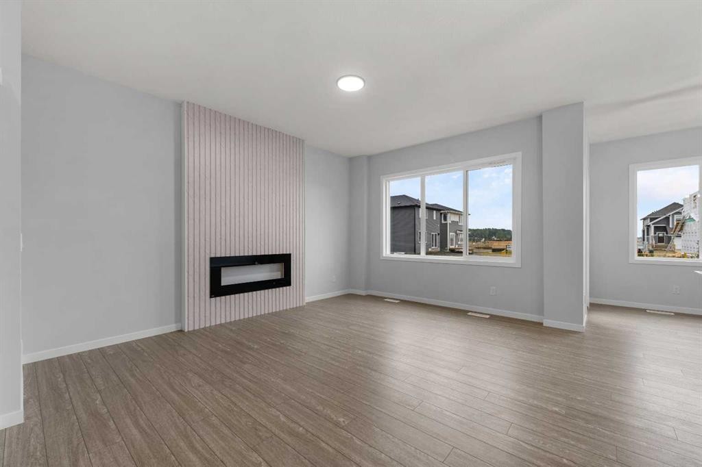 532 Clearwater Heath, Chestermere, AB - Indoor Photo Showing Living Room With Fireplace