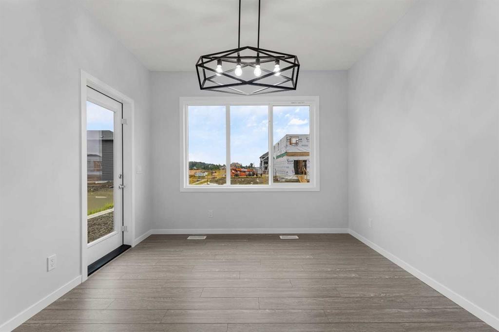 532 Clearwater Heath, Chestermere, AB - Indoor Photo Showing Other Room