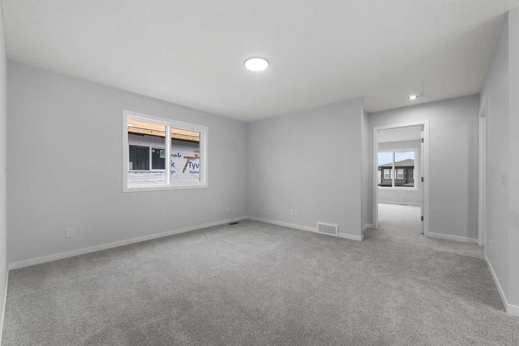532 Clearwater Heath, Chestermere, AB - Indoor Photo Showing Other Room