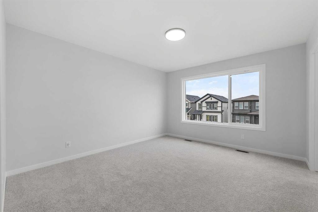 532 Clearwater Heath, Chestermere, AB - Indoor Photo Showing Other Room