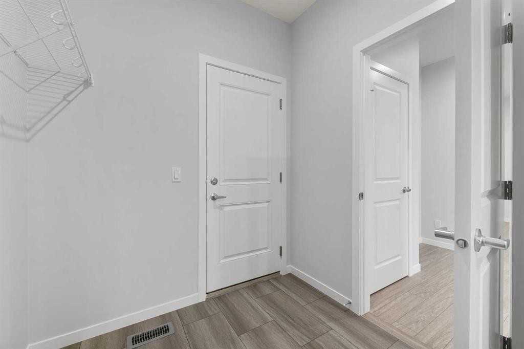 532 Clearwater Heath, Chestermere, AB - Indoor Photo Showing Other Room