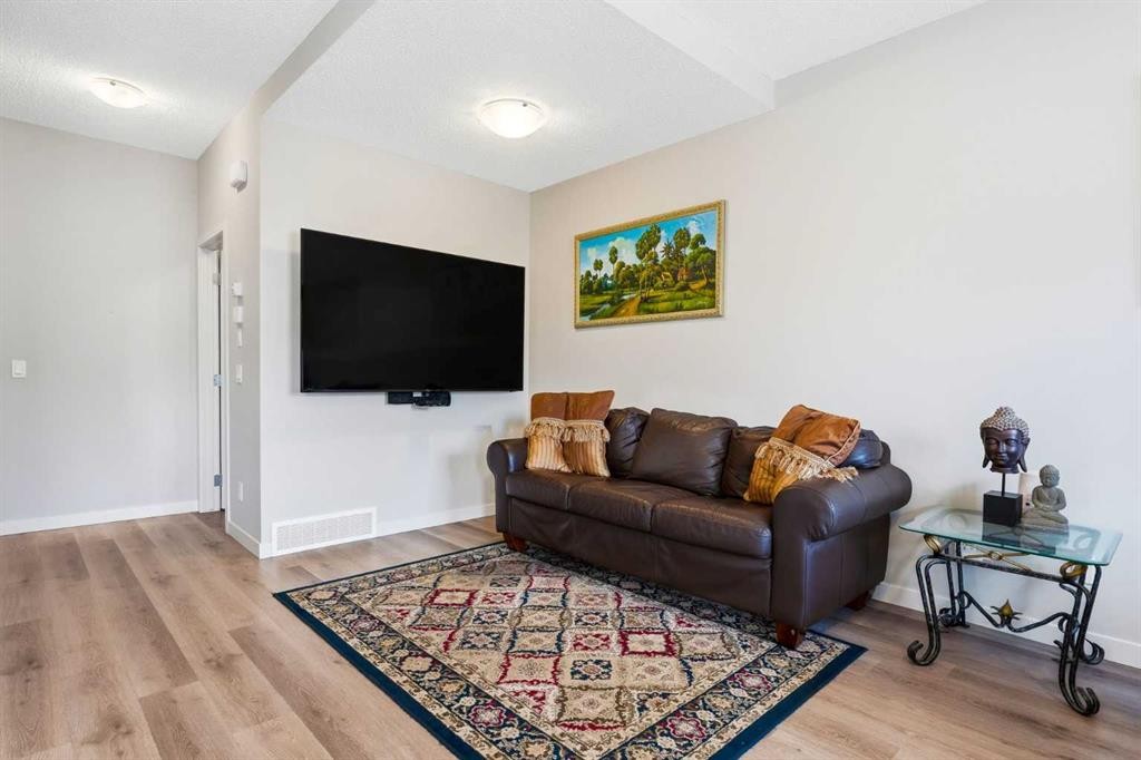 308-32 Red Embers Parade Ne, Calgary, AB - Indoor Photo Showing Living Room