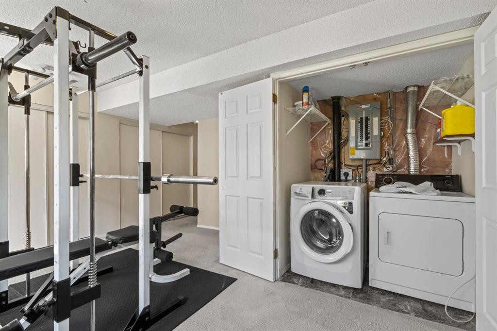 623 Hawkstone Manor Nw, Calgary, AB - Indoor Photo Showing Laundry Room
