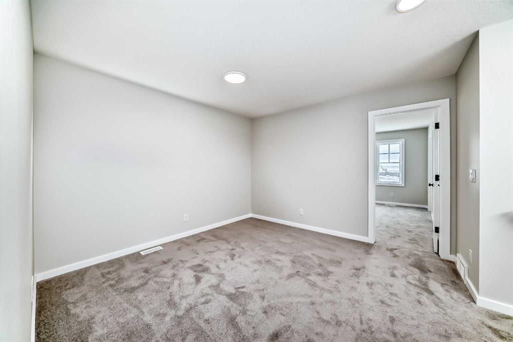 828 Sora Boulevard Se, Calgary, AB - Indoor Photo Showing Other Room