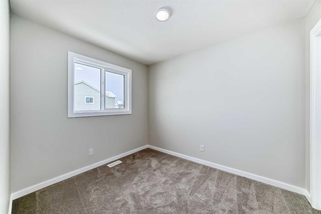 828 Sora Boulevard Se, Calgary, AB - Indoor Photo Showing Other Room