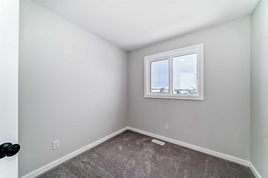 828 Sora Boulevard Se, Calgary, AB - Indoor Photo Showing Other Room