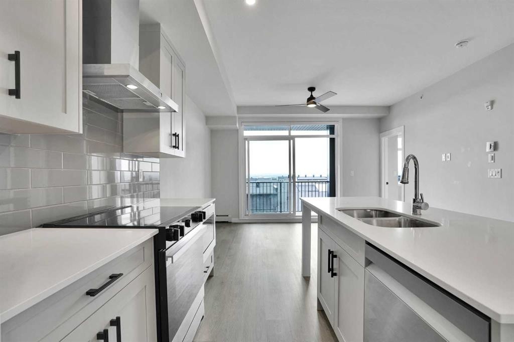 6412-200 Seton Circle Se, Calgary, AB - Indoor Photo Showing Kitchen With Double Sink