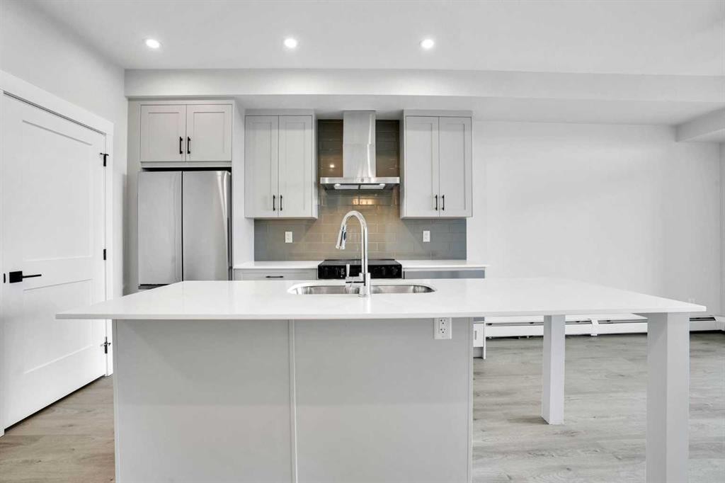 6412-200 Seton Circle Se, Calgary, AB - Indoor Photo Showing Kitchen With Double Sink With Upgraded Kitchen