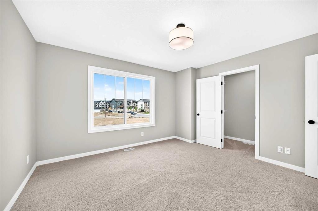 277 Heirloom Way Se, Calgary, AB - Indoor Photo Showing Other Room